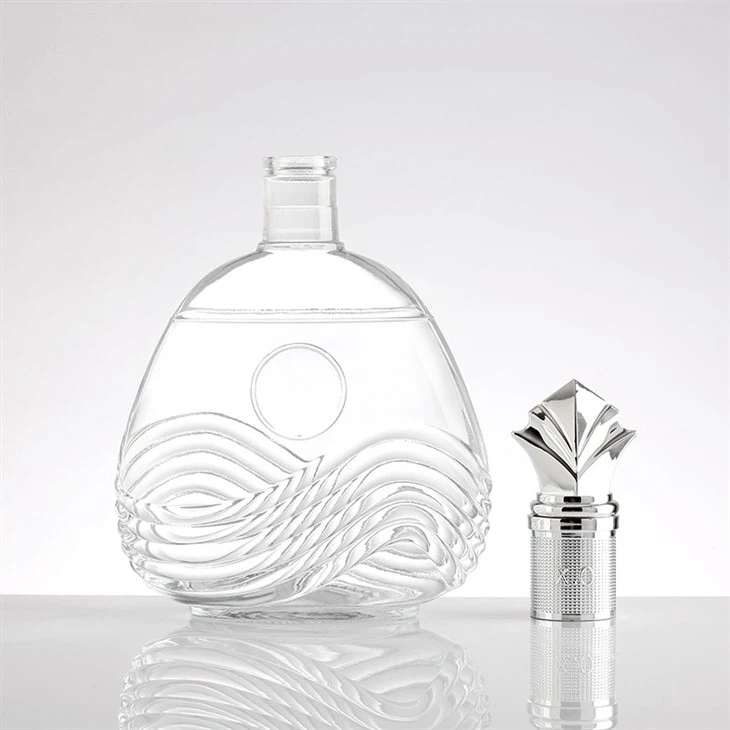 Transparent Bottle With Wavy Pattern And Silver Crown Cap